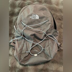 The North Face Gray Backpack with Elastic Cord Detailing